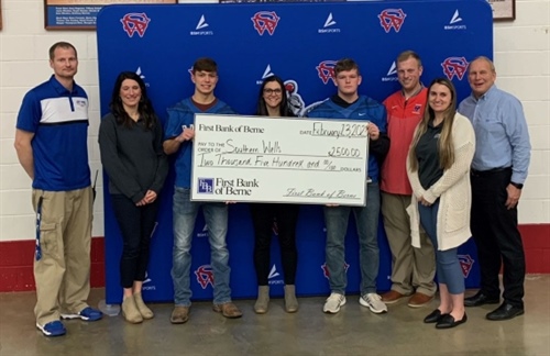 FIRST BANK OF BERNE DONATES TO SOUTHERN WELLS COMMUNITY SCHOOLS